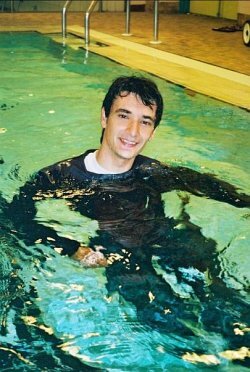 wet jeans and swim top