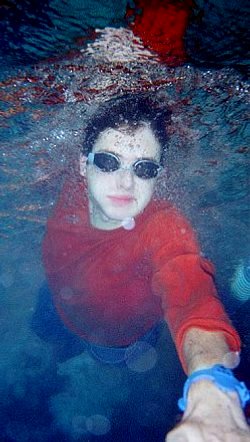 front crawl wimming in clothes