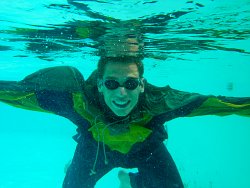 underwater swimming in rain suit