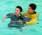 RESCUES, CASUALTY, CONSCIOUS, TOW, 2 APPROACH
Approach the casualty from behind and pick up wth approriate tow 3