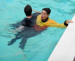 RESCUES, CASUALTY, CONSCIOUS, TOW, 4 CROSS CHEST TOW
Support the casualty on the poolside and assist them out 5